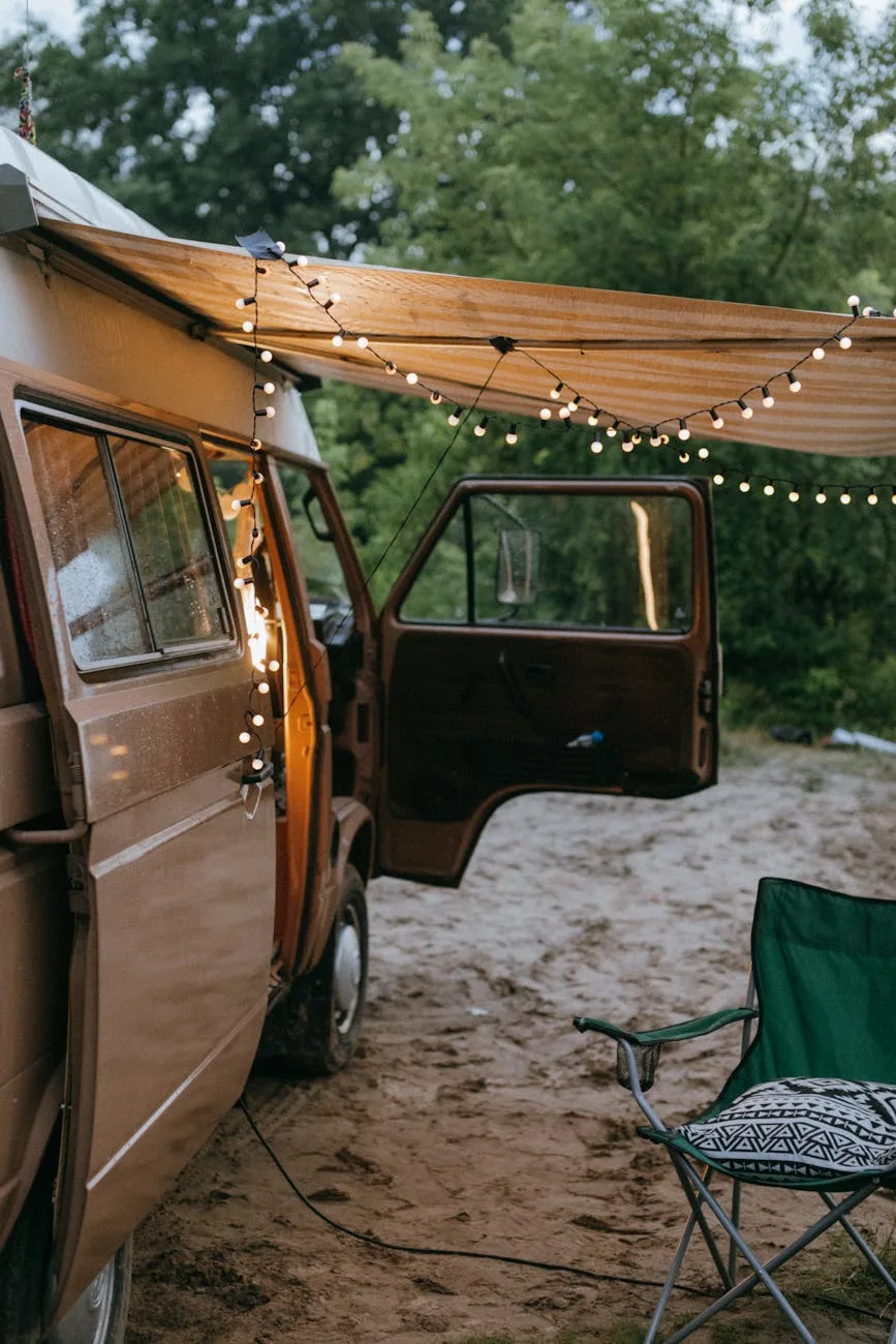 folding chair beside a van with tent