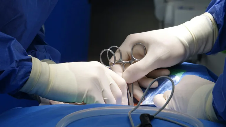 surgeons performing precise operation in hospital