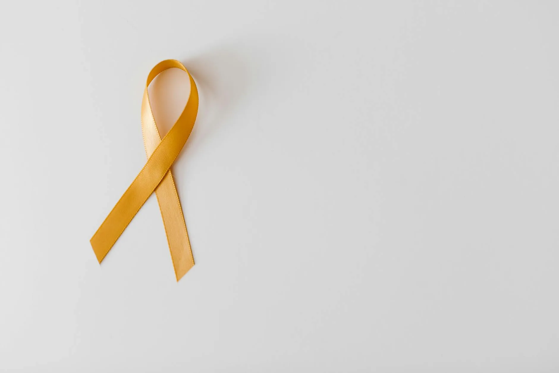 yellow ribbon on white background